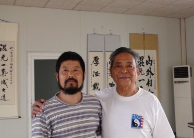 Chen Zhonghua with Grandmaster Feng Zhiqiang